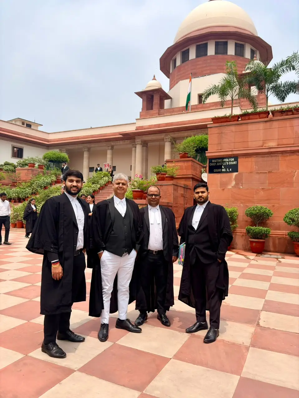 Advocate Gourav Prasad with legal team outside the Supreme Court of India